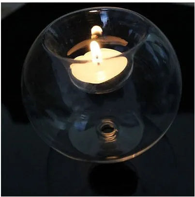 European style round hollow glass candle handmade from hot glass in spherical design