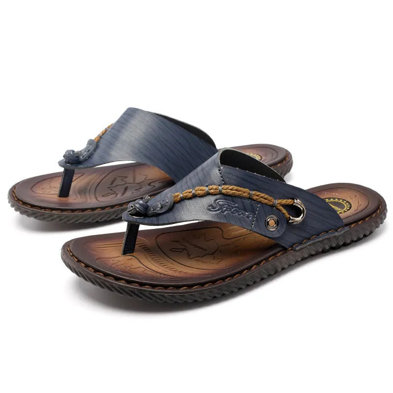 Men's dark blue herringbone pattern outdoor slippers with leather lining and a rubber sole.