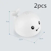 Automatic water spray whale bath toy with lights floating in baby bath