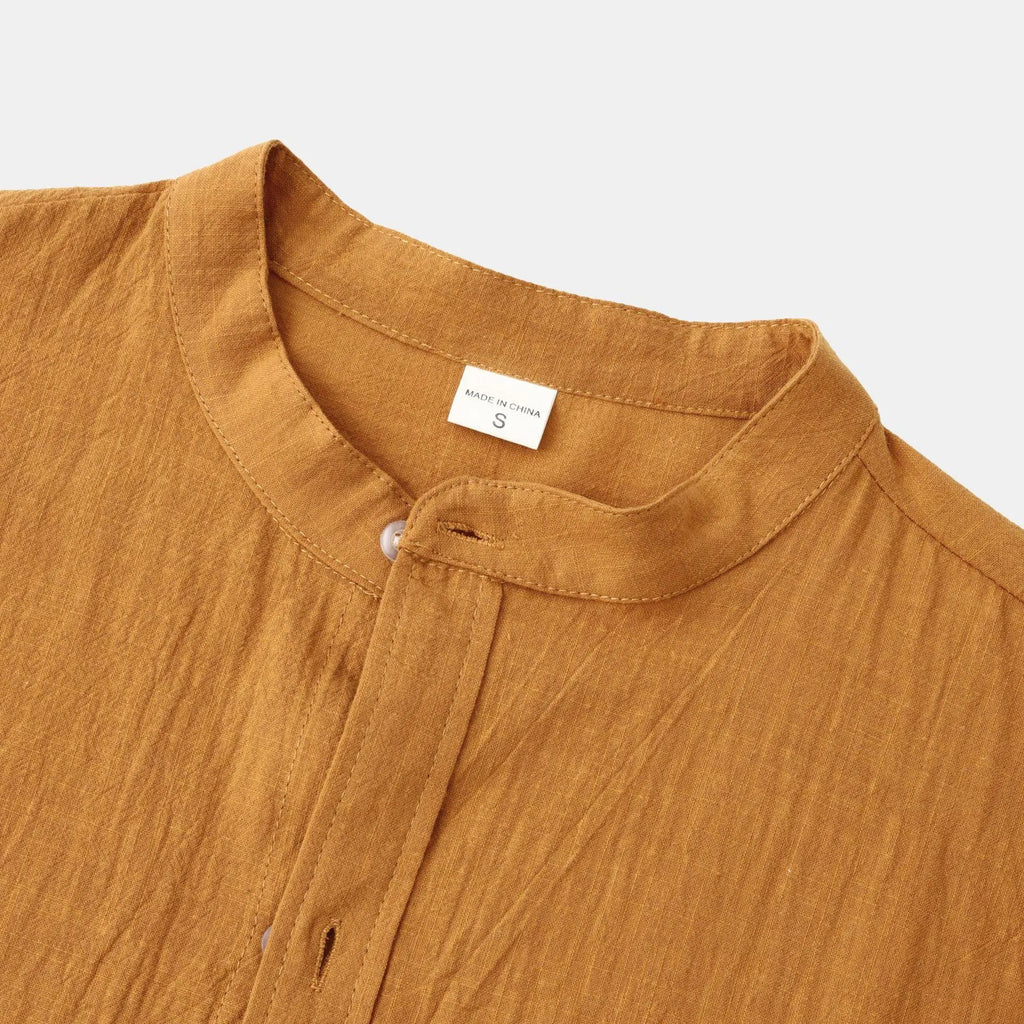 Men's brown long sleeve cotton blend shirt and casual trousers set on a hanger