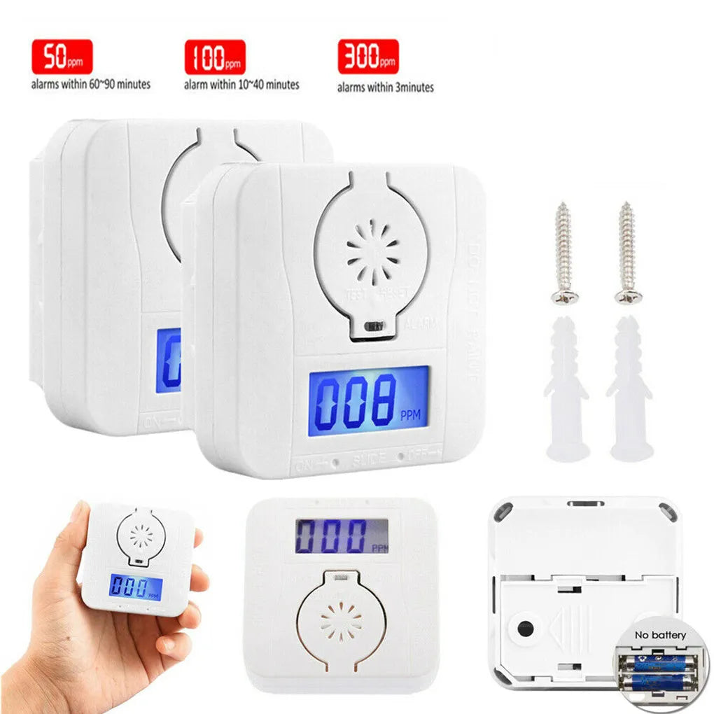 White wireless carbon monoxide alarm mounted on a wall for home safety.