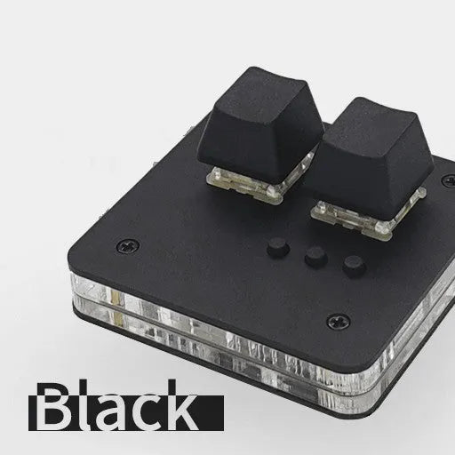 Compact white mini USB keyboard with a touch panel and multimedia keys on a desk.