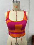 Women's slim-fit U-collar camisole top in a choice of five colours with an exposed midriff design.