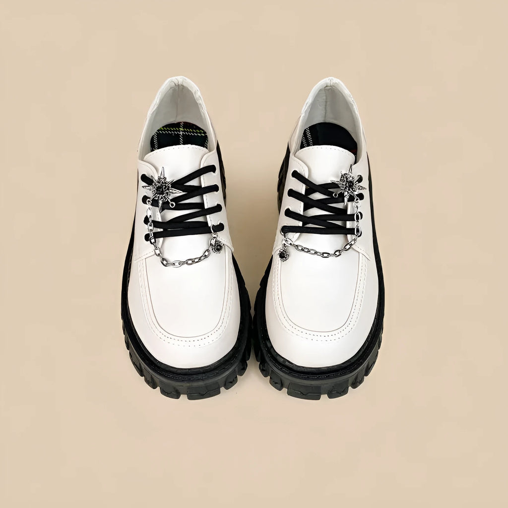 Women's Duke Asterism colour loafers with a cross strap and metal buckle on a round toe.