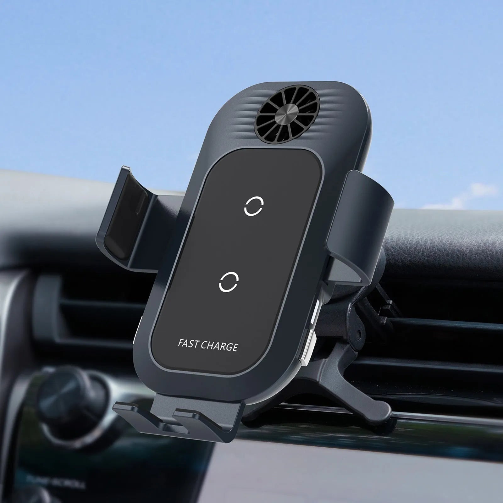 Black car wireless phone charger mounted on a vehicle air vent, showing phone held in auto-clamp.