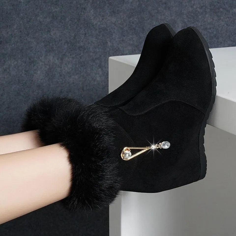 Black height increasing insole snow boots for women with fur integration upper and casual design