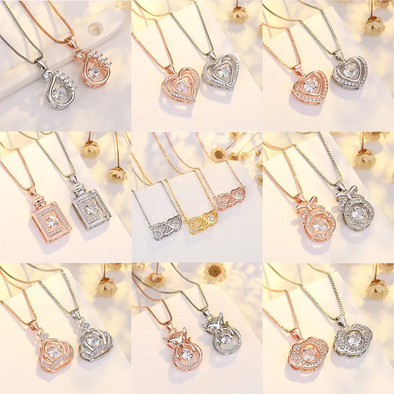 Sterling silver heart pendant necklace with crown and bow detailing in rose gold or silver finish