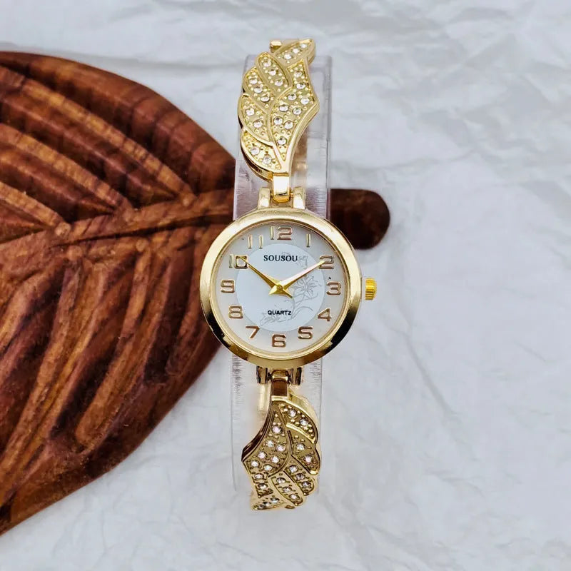 Women's stainless steel fashion watch with round dial showing gold surface option