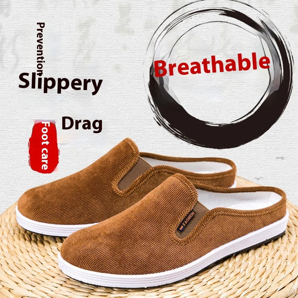 Men's casual slip-on sneakers in black with non-slip rubber sole and mesh lining