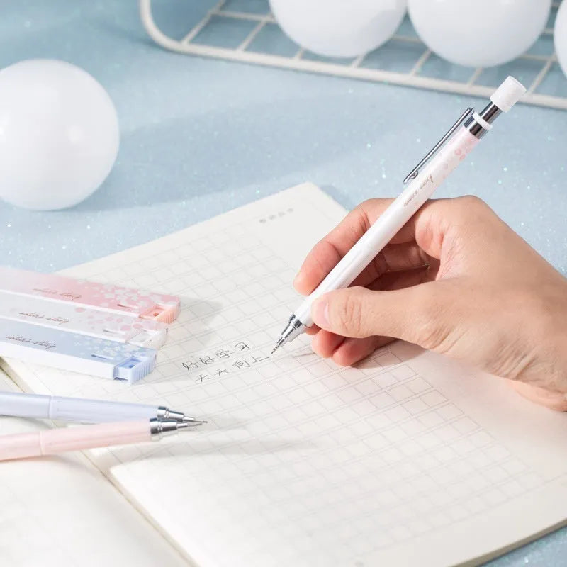 Three automatic pencils with cartoon Sakura law design and HB refill boxes