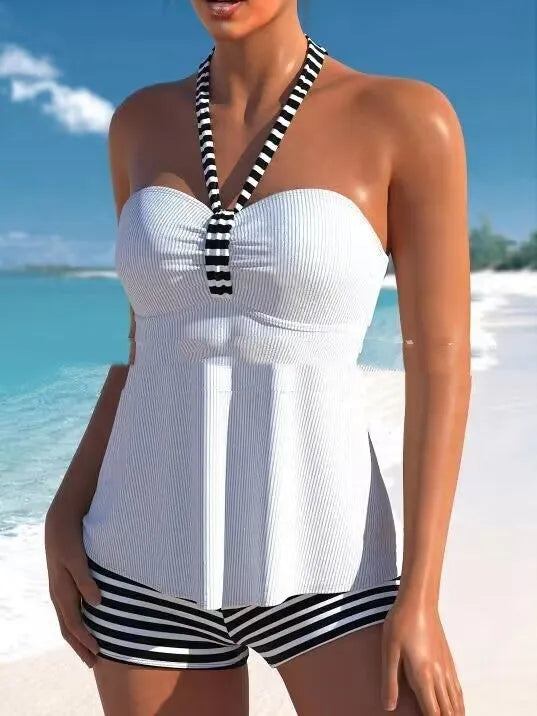 White off-shoulder women's swimsuit with black and white stripes, briefs style.