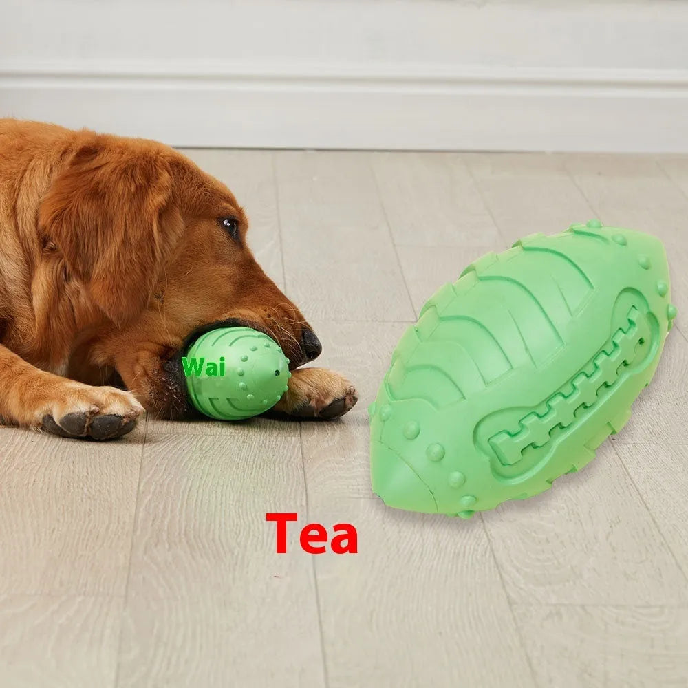 Bite-resistant rubber rugby ball dog toy in light green for teeth cleaning and training