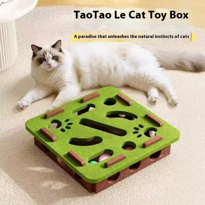 Green brown felt box cat toy with holes for scratching and hiding, measuring 30cm square.