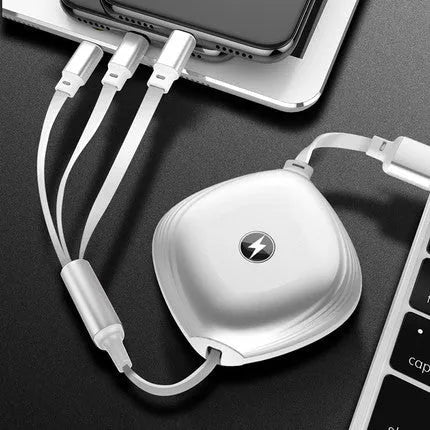 Black retractable 3-in-1 USB charging cable extended to 1.2 metres with titanium alloy connectors.