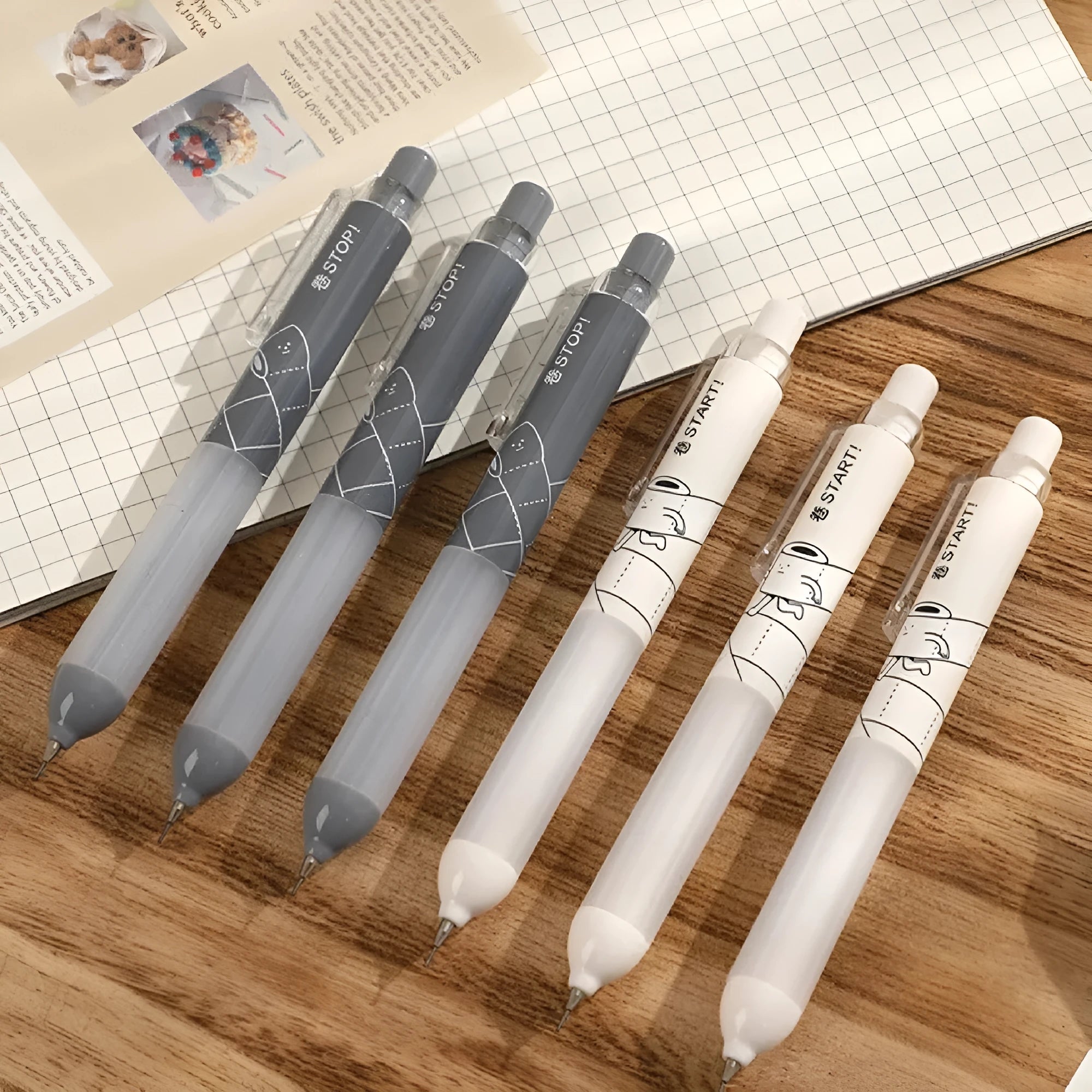 Activity 0.5mm mechanical pencils with cloud grip, one black and one white