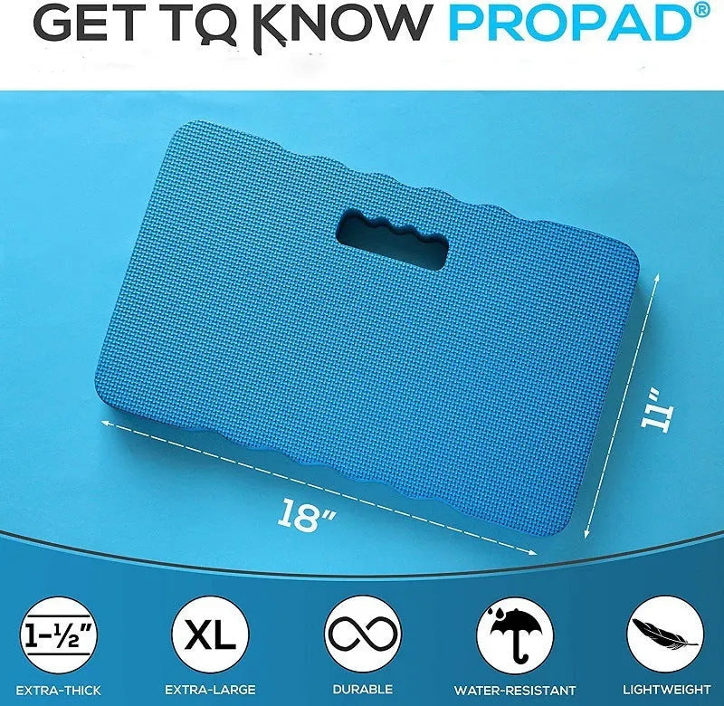 Solid blue EVA foam garden kneeler pad on soil for comfortable planting and weeding.