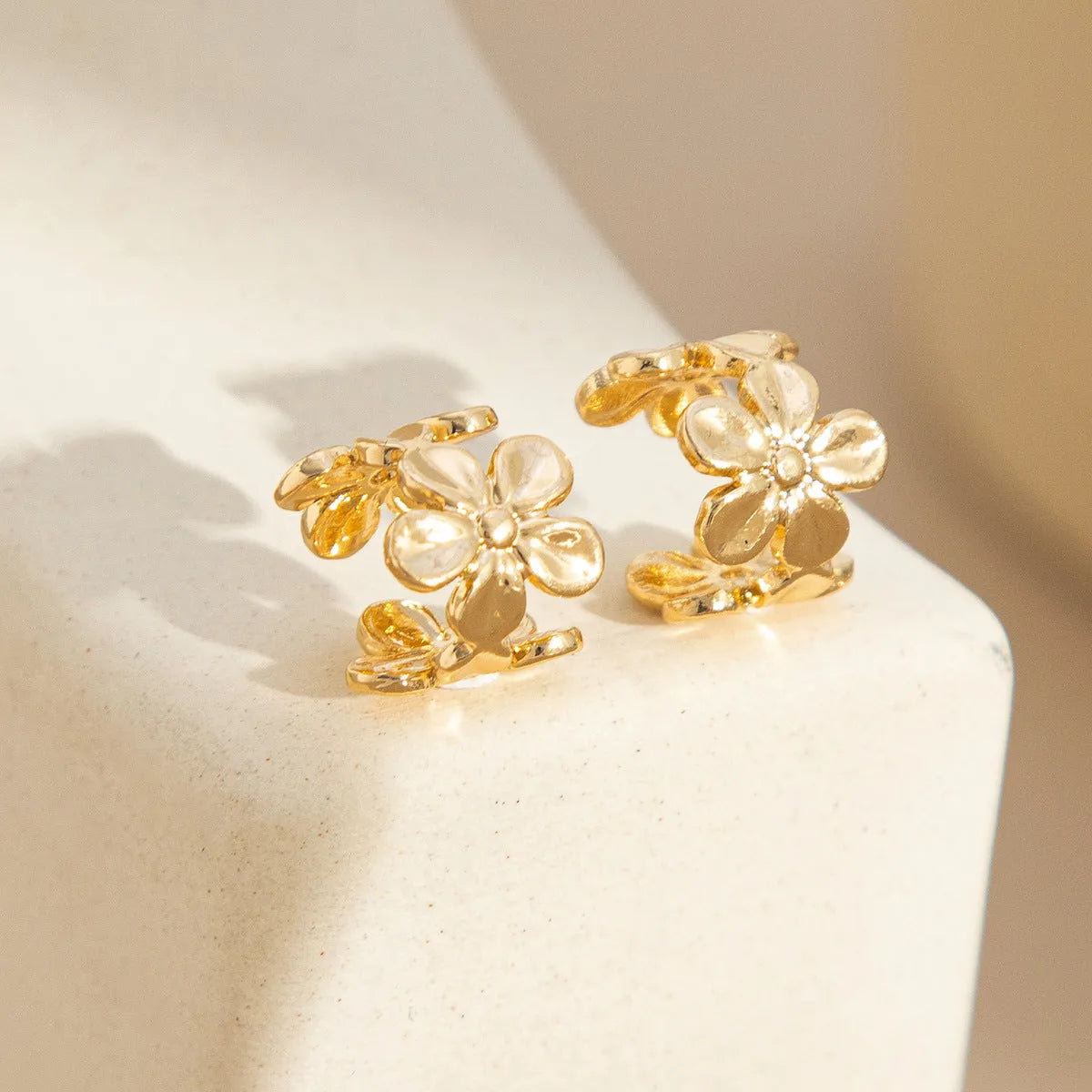 Gold starfish and scallop shell earrings for women with electroplated alloy construction