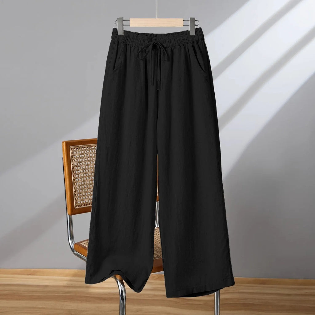Women's straight-leg casual trousers in apricot colour with elastic drawstring waist