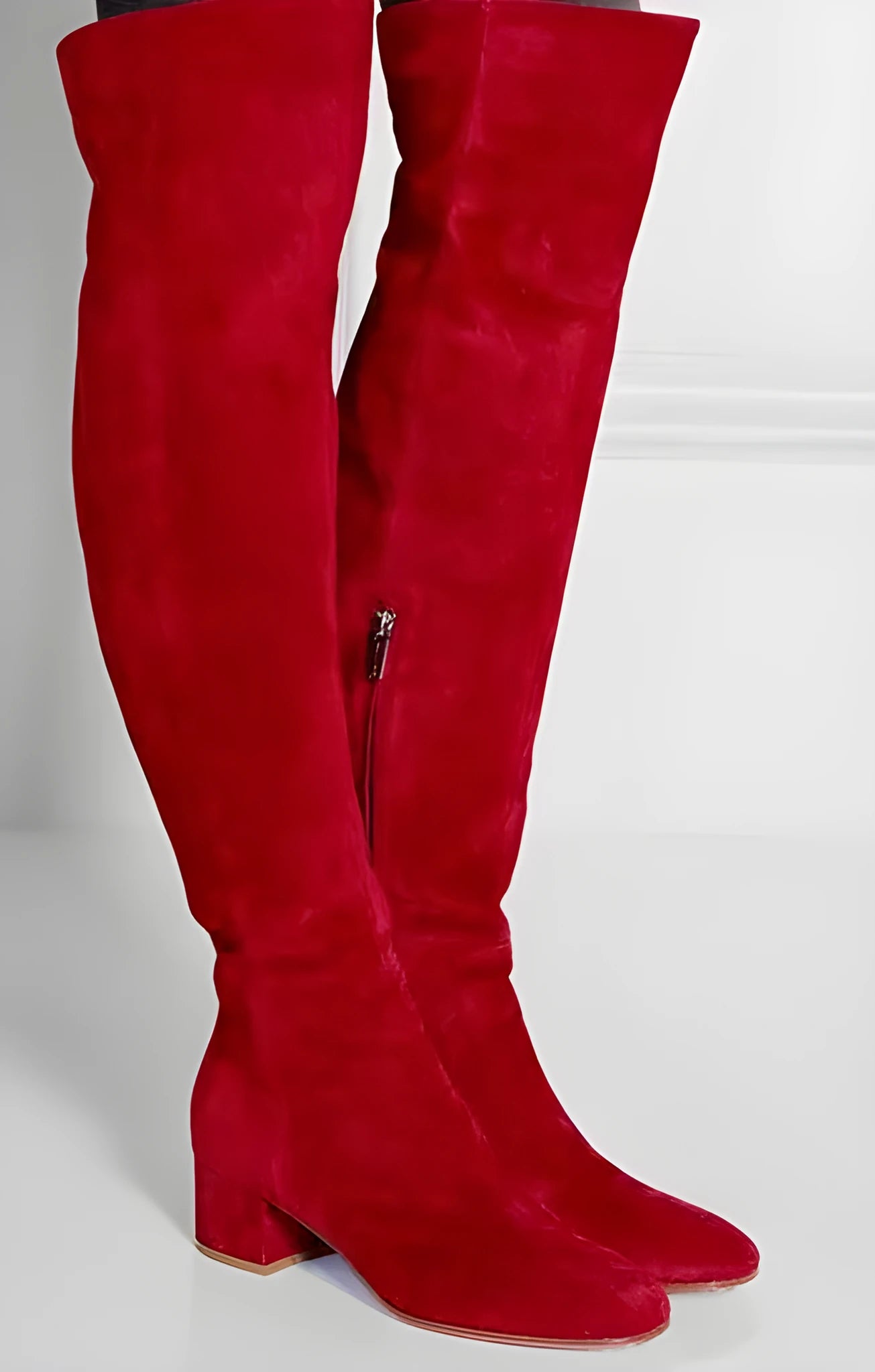 Grey suede women's flat over-the-knee boots with a pointed toe and low thick heel.