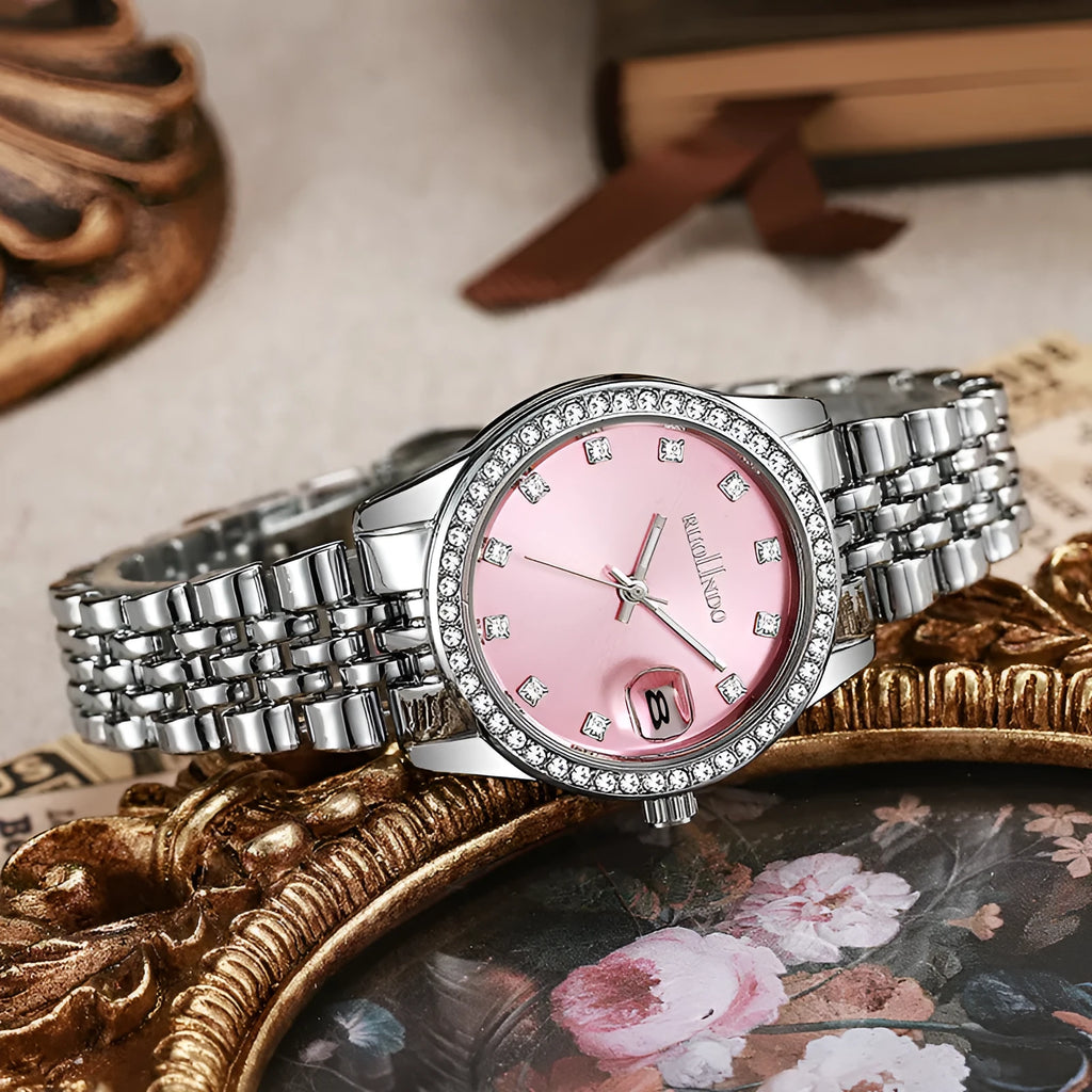 Silver women's alloy watch with circular 32mm dial and stainless steel folding buckle.