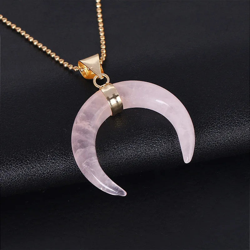 Natural stone moon pendant necklace on a 45cm copper chain, shown in pink or purple colour options.