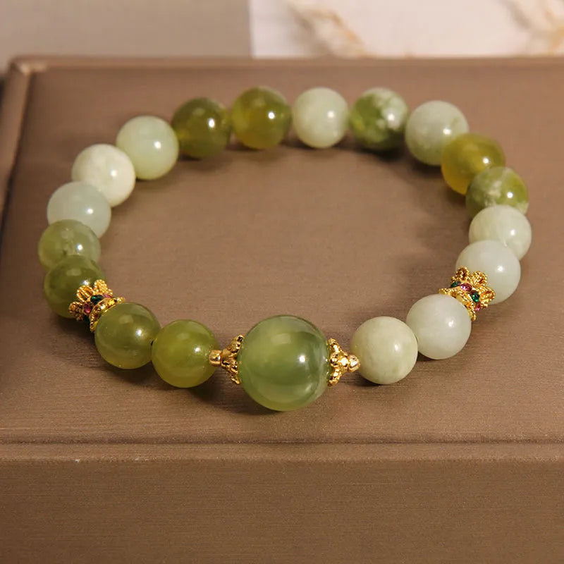 Women's genuine jade bracelet in Xiuyan jade green colour, mori-inspired original design.