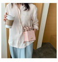 One shoulder messenger bag with fashion chain detail in bucket shape available in six colours