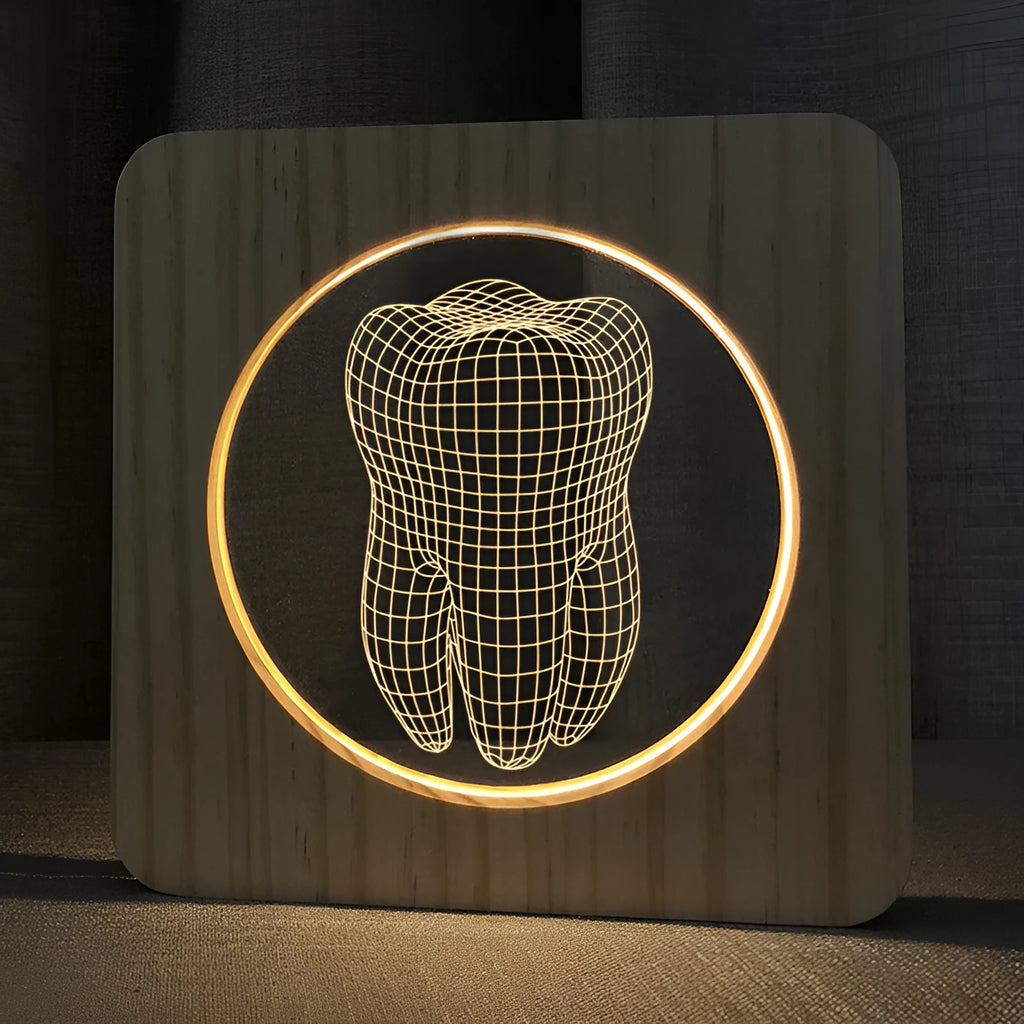 Wood-colour tooth-shaped acrylic USB night lamp on a surface