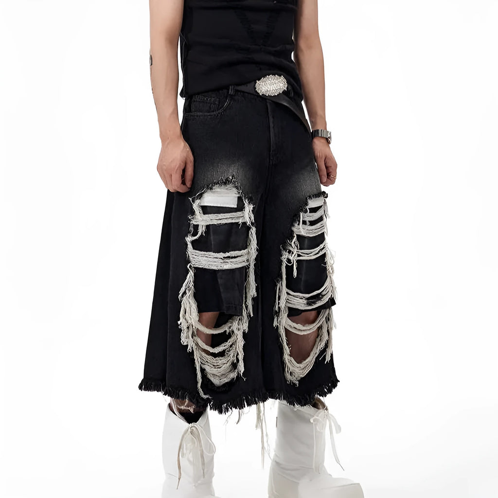 Women's black cropped wide leg jeans with ripped patch details and mid-high waist