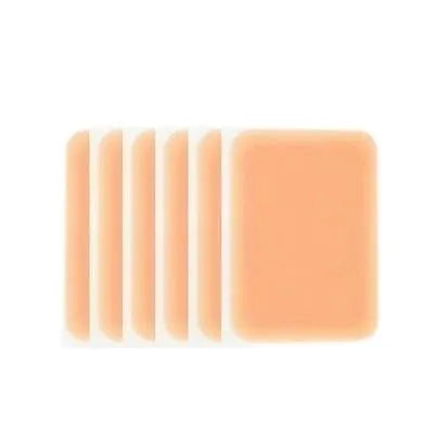 Pack of adhesive tattoo cover patches in various skin tone colours on a white background.