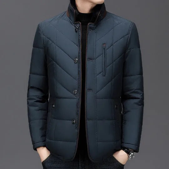 Men's solid colour winter short coat with side pockets, shown in dark blue.