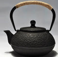 Japanese style cast iron teapot with traditional patterns and 0.9L capacity
