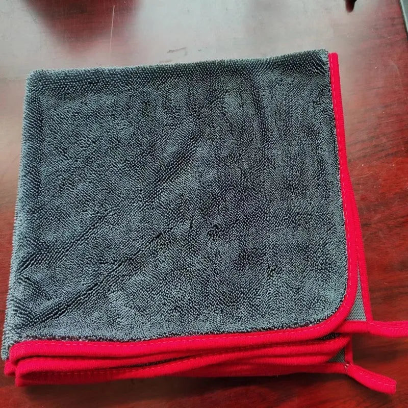 Grey braided twisted car cleaning towel shown with red edge variant, sizes range from small to large.