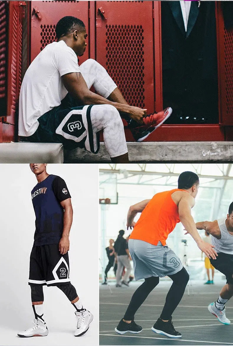 Men's polyester training shorts five-quarter length in black with white side panel for running and fitness