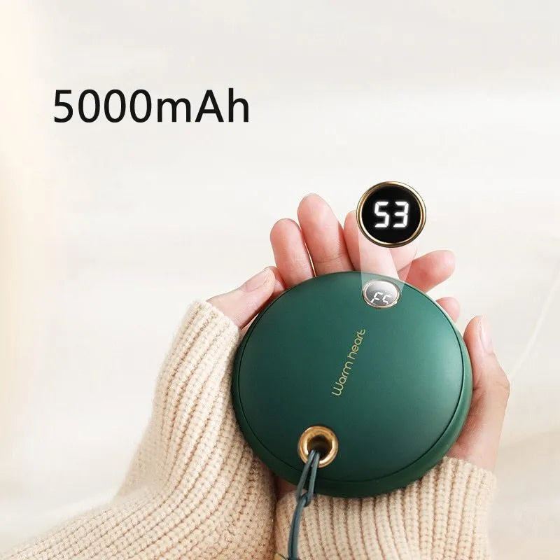 Green hand warmer power bank with digital display showing battery level, measuring 89.5mm square