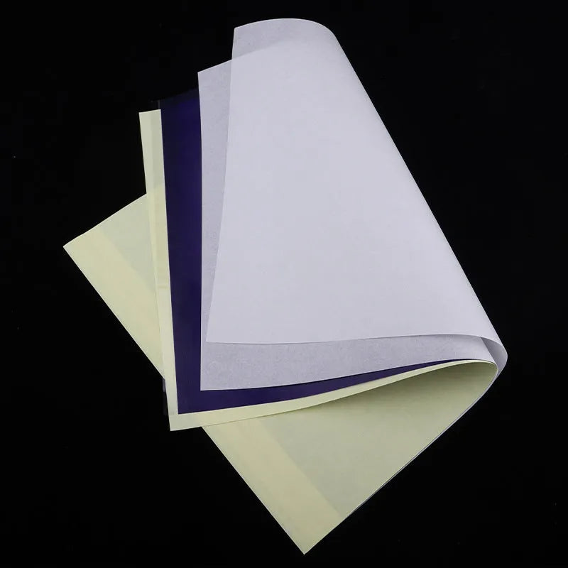 A4 quadruple tattoo transfer paper sheets with hand-drawn lines for stencil creation