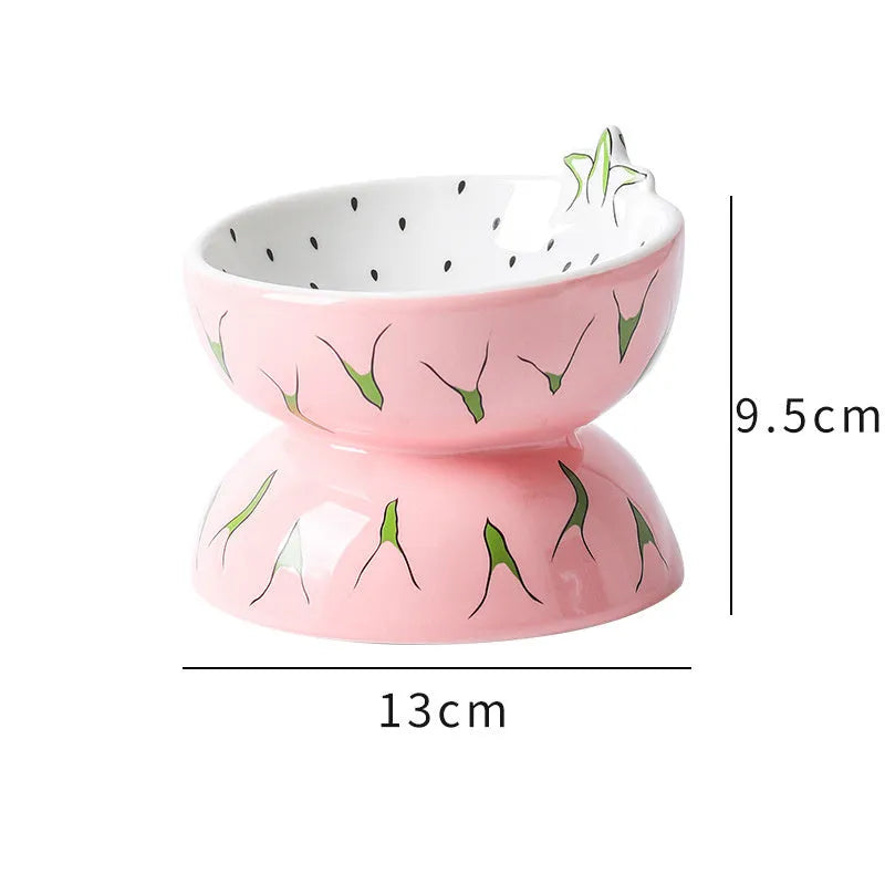 Ceramic raised cat bowl in orange with tilted design for food and water