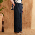 Linen straight-leg casual trousers with an elasticated high waistband in greige colour.