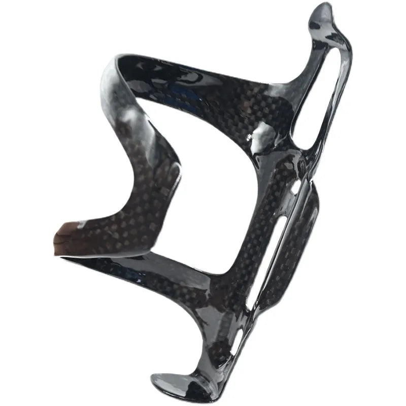 Black carbon fibre bicycle water bottle cage for road and mountain bikes.