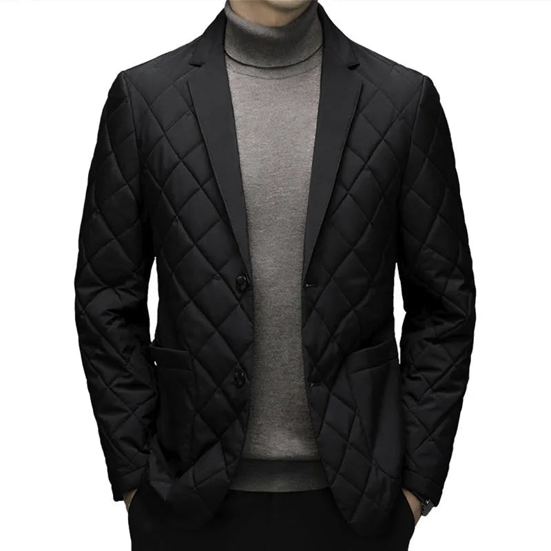 A man wearing a solid-colour thick down jacket with a lapel and side seam pockets.