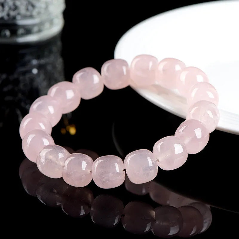 Pink natural crystal bracelet with 11-12mm geometric barrel beads and bamboo-inspired design