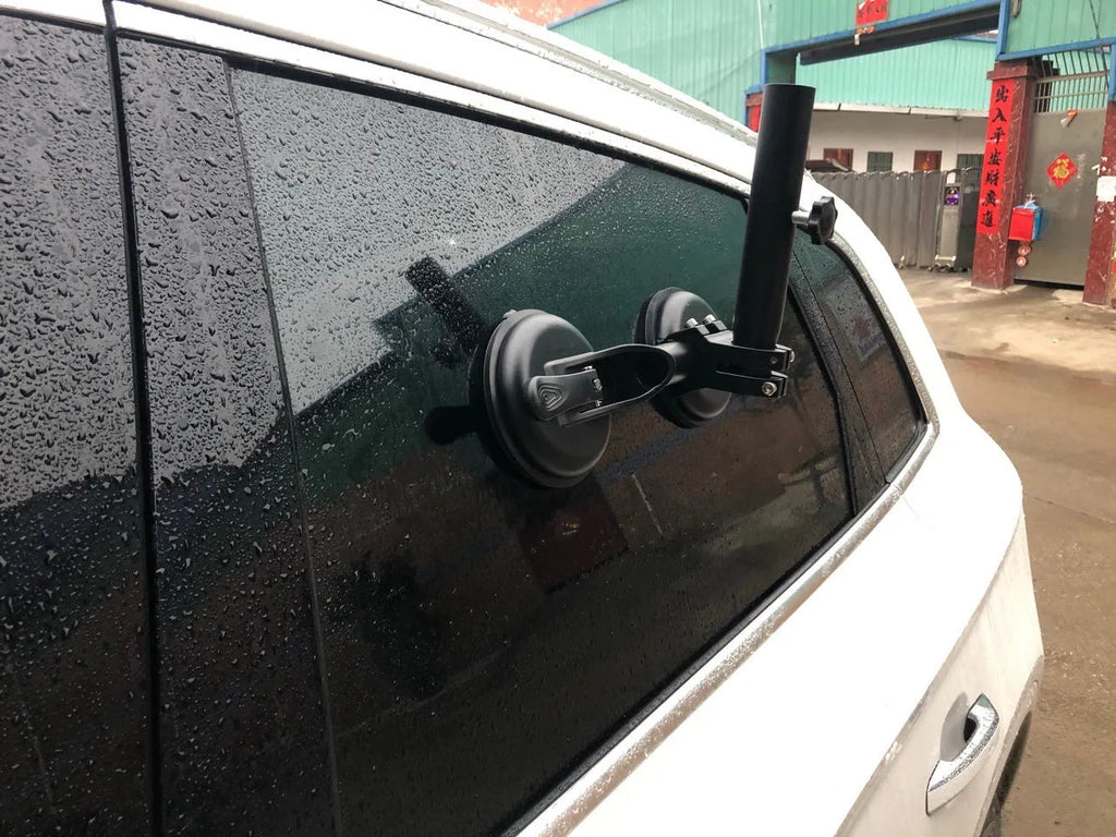 Black off-road car sucker mount with rubber suction cup for attaching flags to vehicle windows.