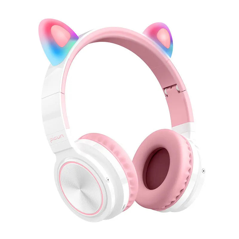 Pink and white Bluetooth over-ear headphones with braided cable and built-in microphone