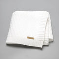 Solid colour infant hug blanket with three-dimensional lines design measuring 70x90cm
