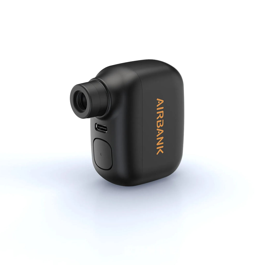 Black AS100 mini electric bicycle pump with USB cable and waterproof storage bag.