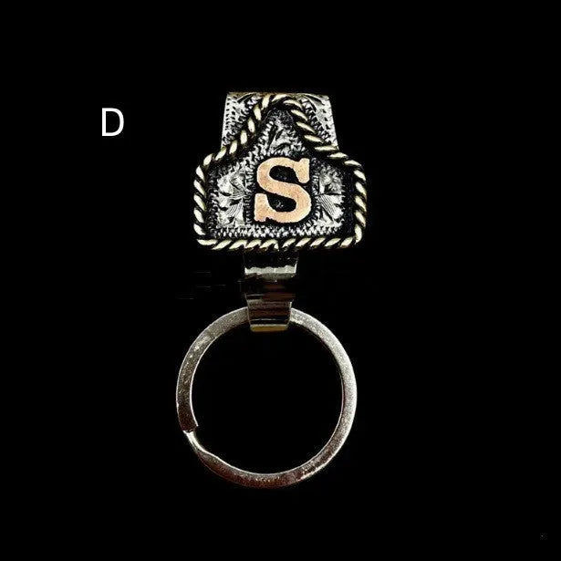 Handmade cow tag belt design metal keychain on a key ring