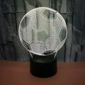 3D football themed night light showing multiple colour options on a black base