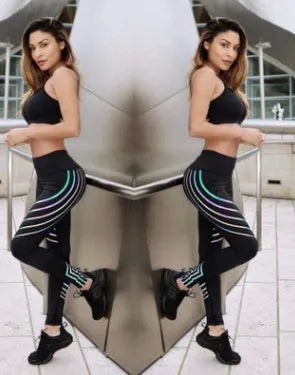 Women's black Milk Silk fitness leggings with night-glowing print, high-waisted pencil pants style.