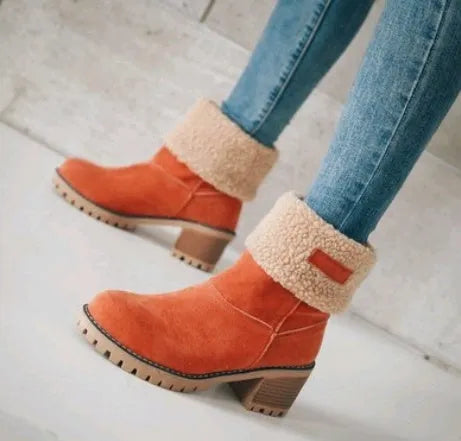Women's mid-calf suede snow boots in grey with a thick heel and waterproof platform sole.