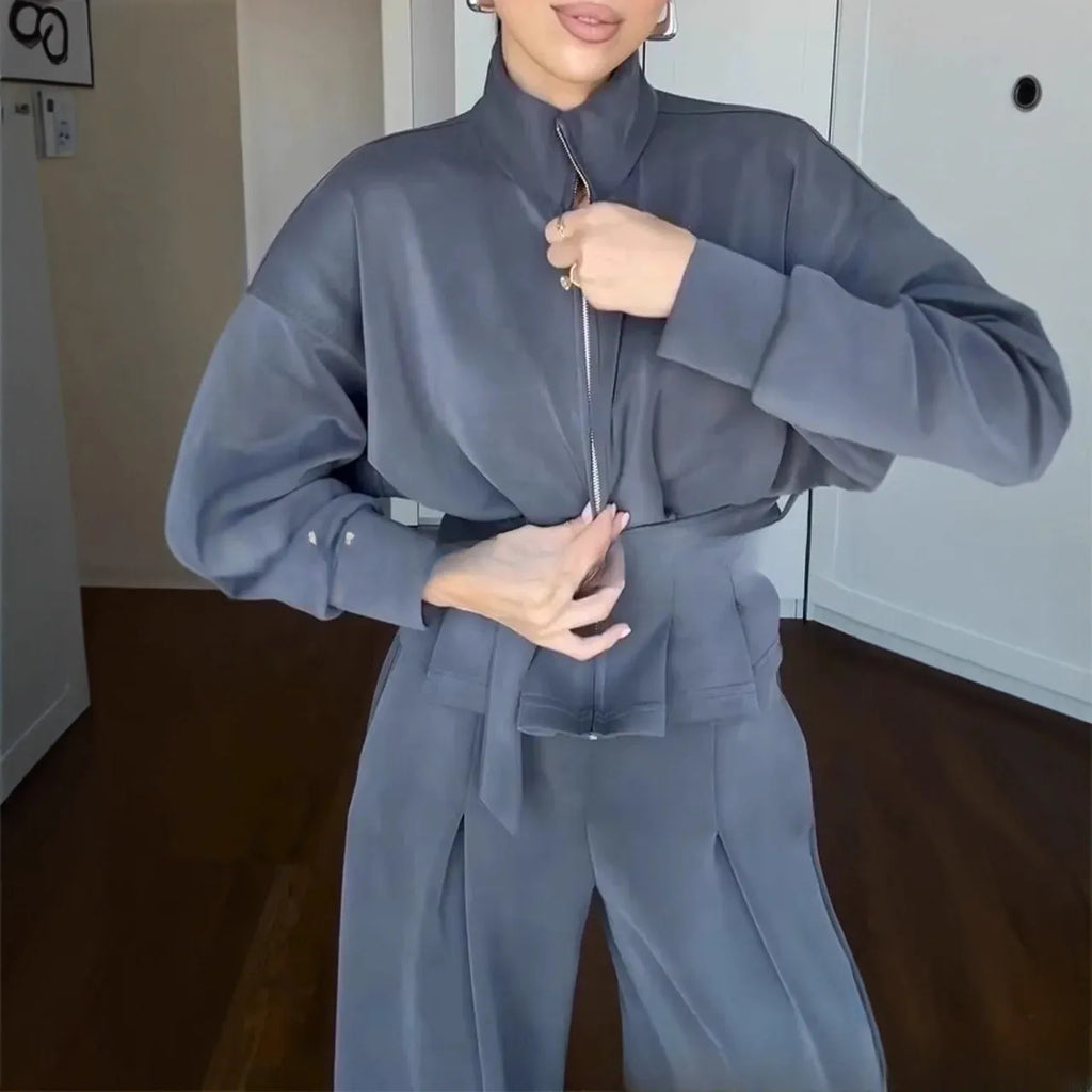 Women's casual polyester suit set with stand collar zipper jacket and pants in dark brown, drop shoulder long sleeves, belt included